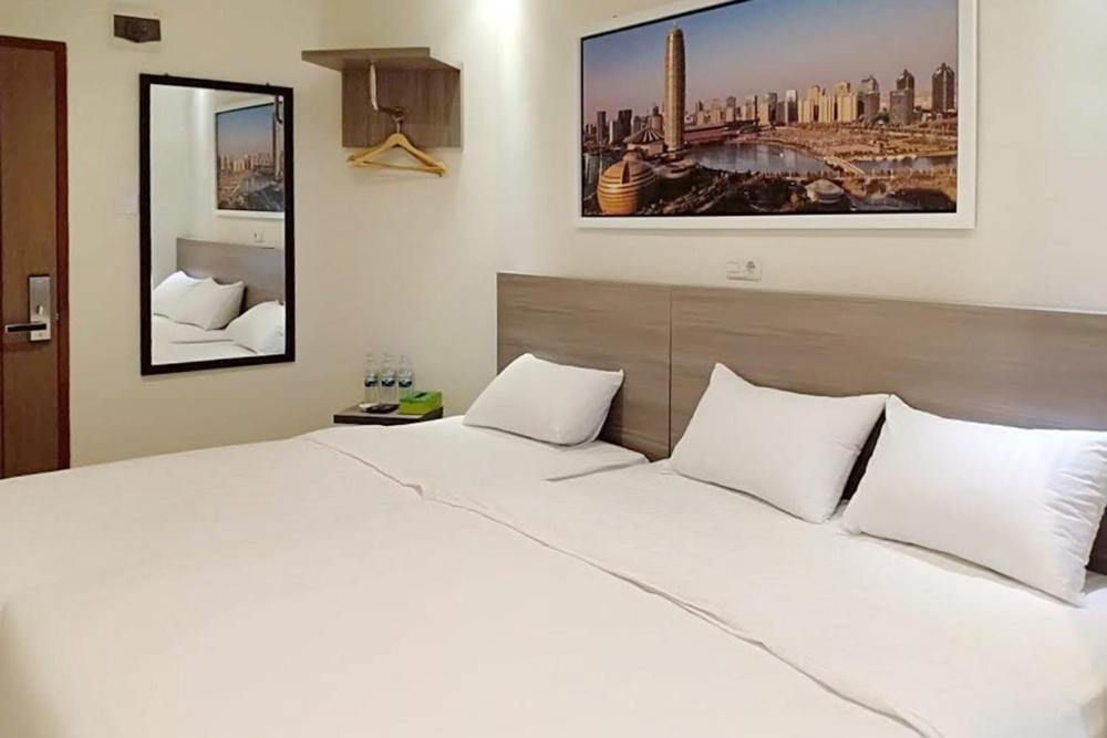 Twospaces Living At Maximus Inn Palembang Exterior foto