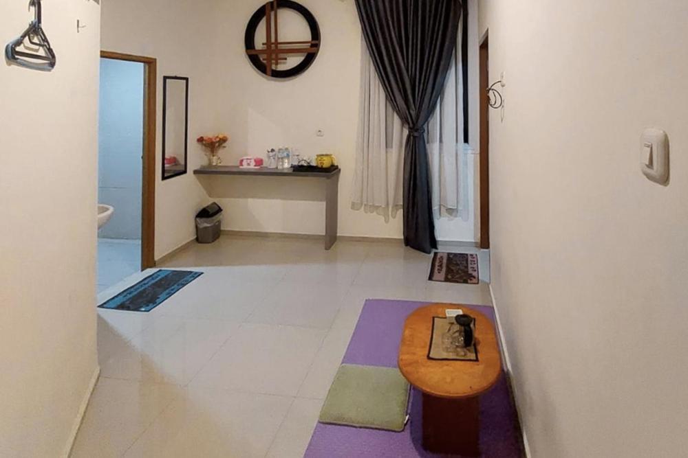 Twospaces Living At Maximus Inn Palembang Exterior foto